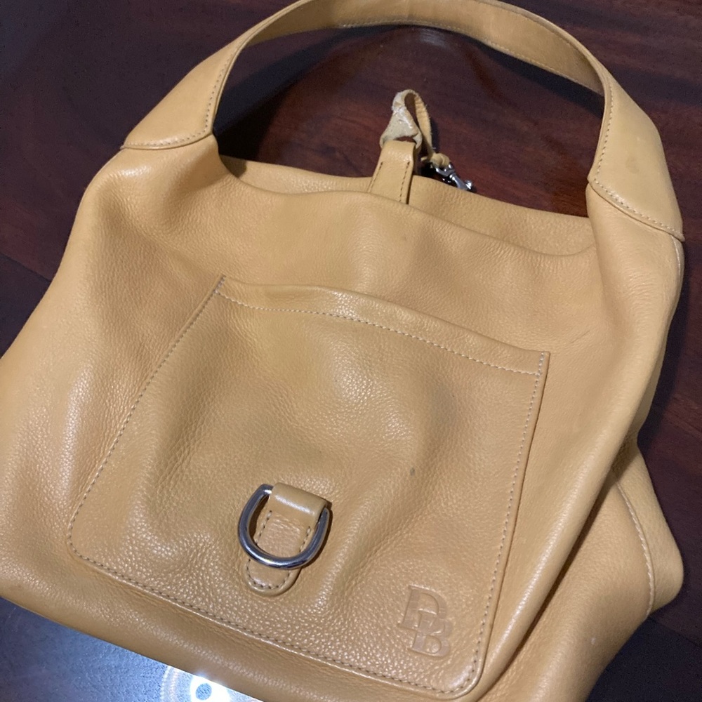 Mustard yellow dooney and Bourke handbag